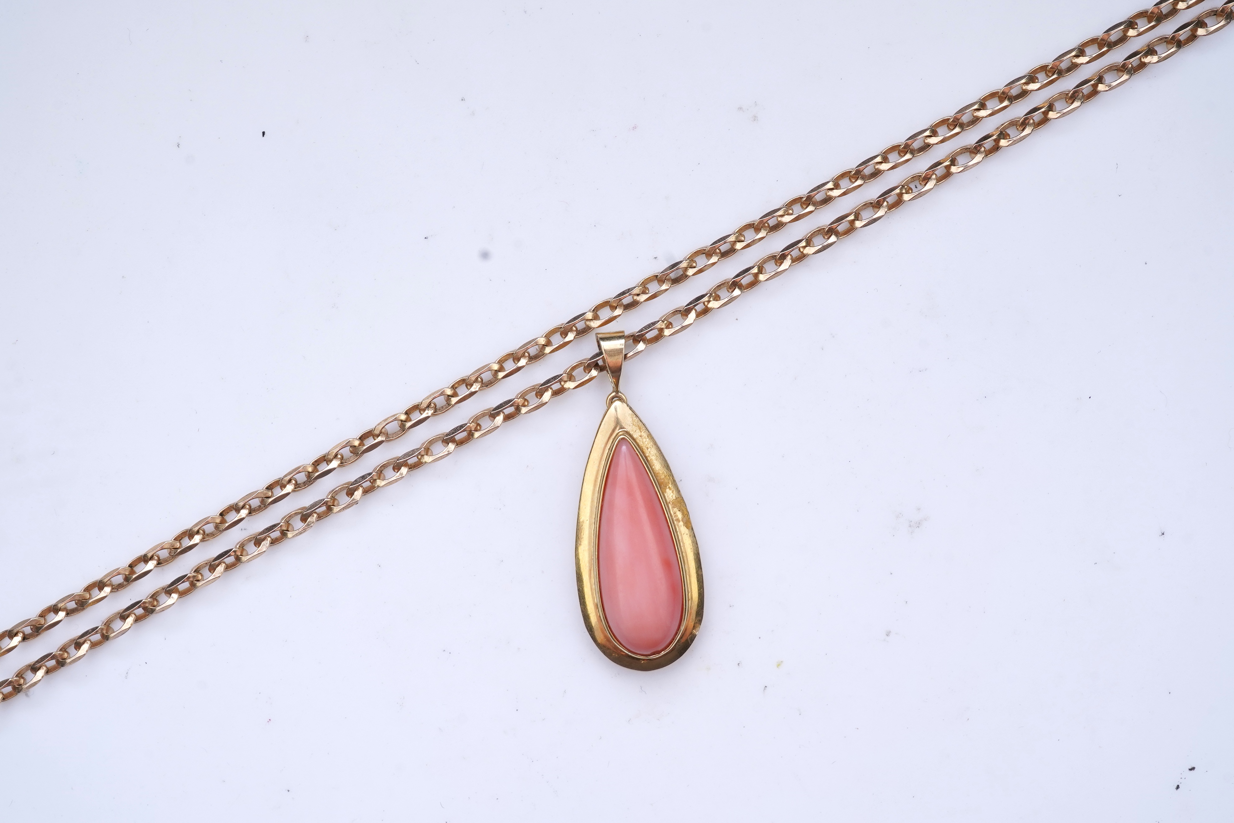 A coral pendant necklace